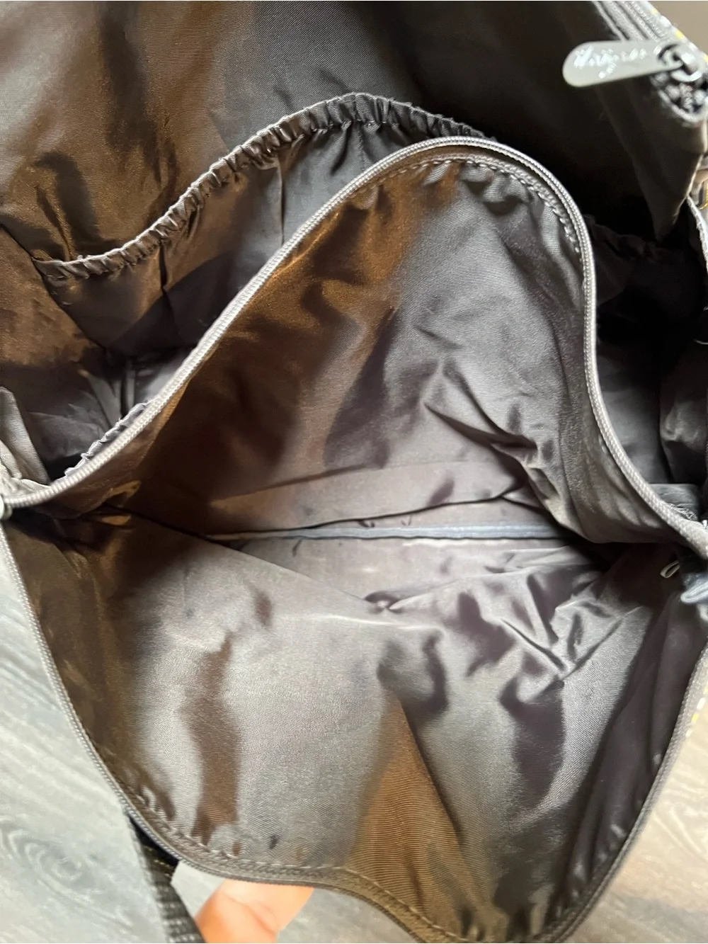 Thirty-One Zip-Top Tote in the Go Go Giraffe print with seven pockets